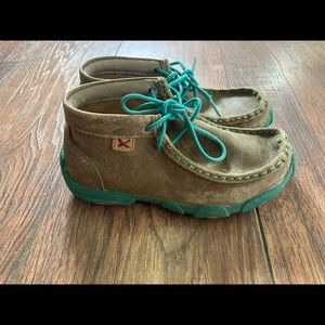 Little girls twisted x shoes with teal stitching